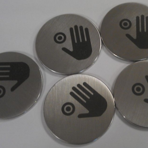 Laser marking of Stainless Steel Buttons for terminal 5